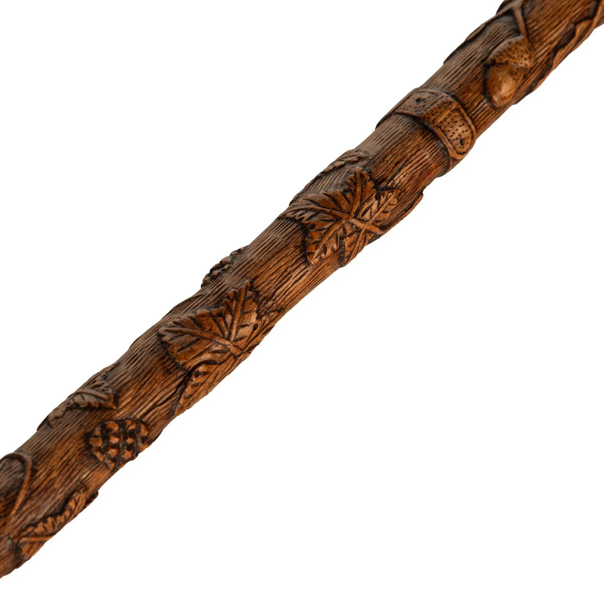 English A finely carved fruitwood cane with royal and masonic symbols