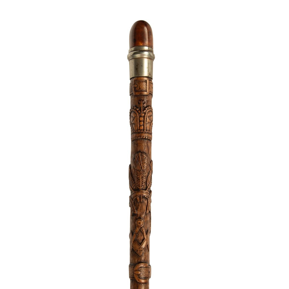 A finely carved fruitwood cane with royal and masonic symbols In Good Condition In Lymington, Hampshire