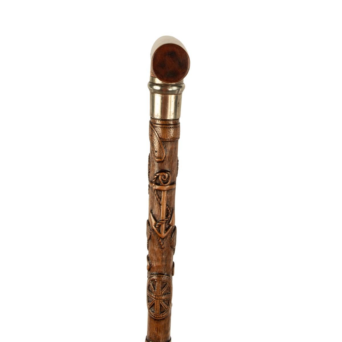 19th Century A finely carved fruitwood cane with royal and masonic symbols