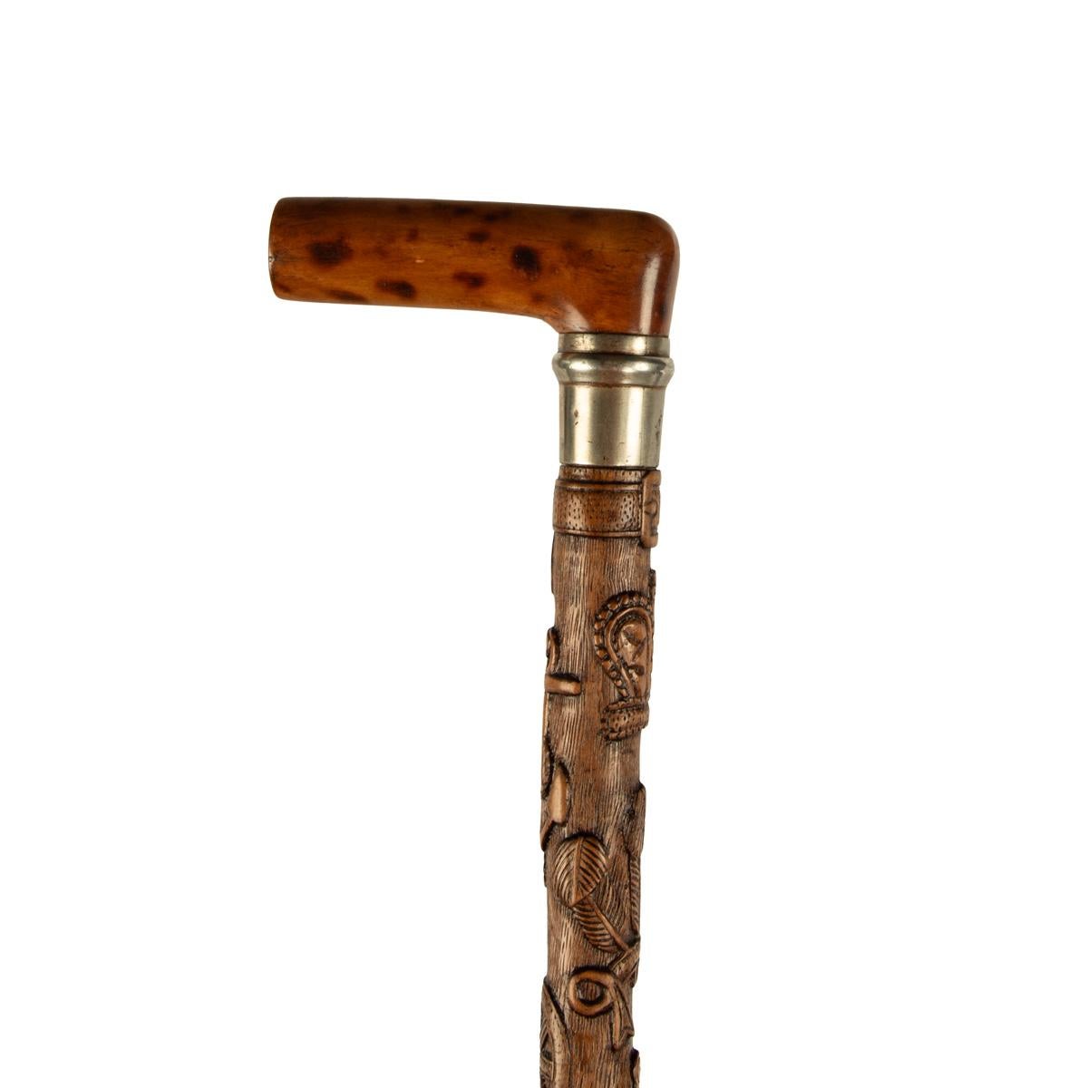 Fruitwood A finely carved fruitwood cane with royal and masonic symbols