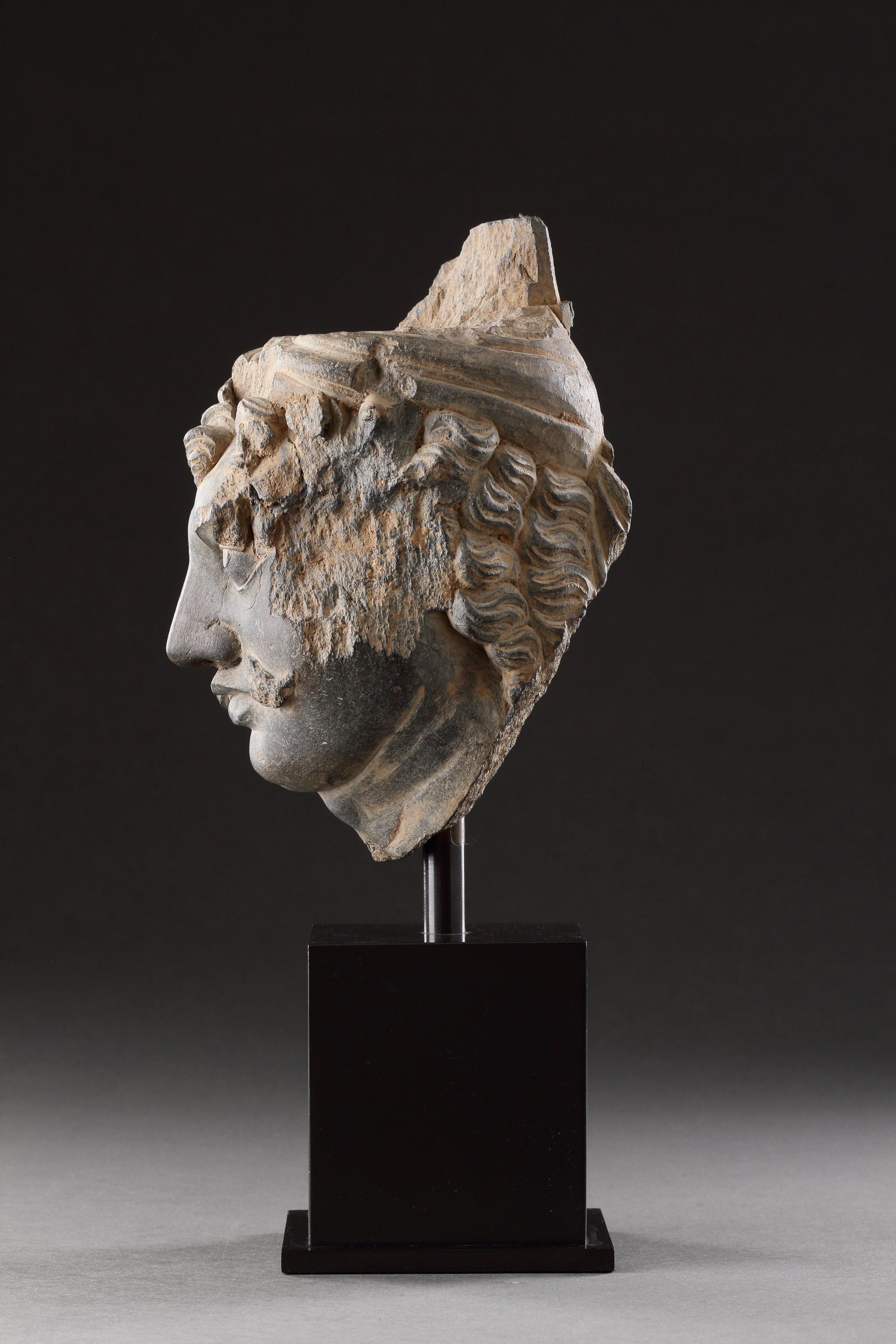 Schist A Finely Carved Gandhara Head of ‘Atlas’ For Sale
