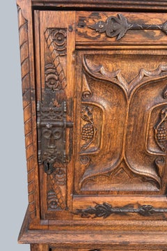 A finely carved Medieval style Gothic Cabinet