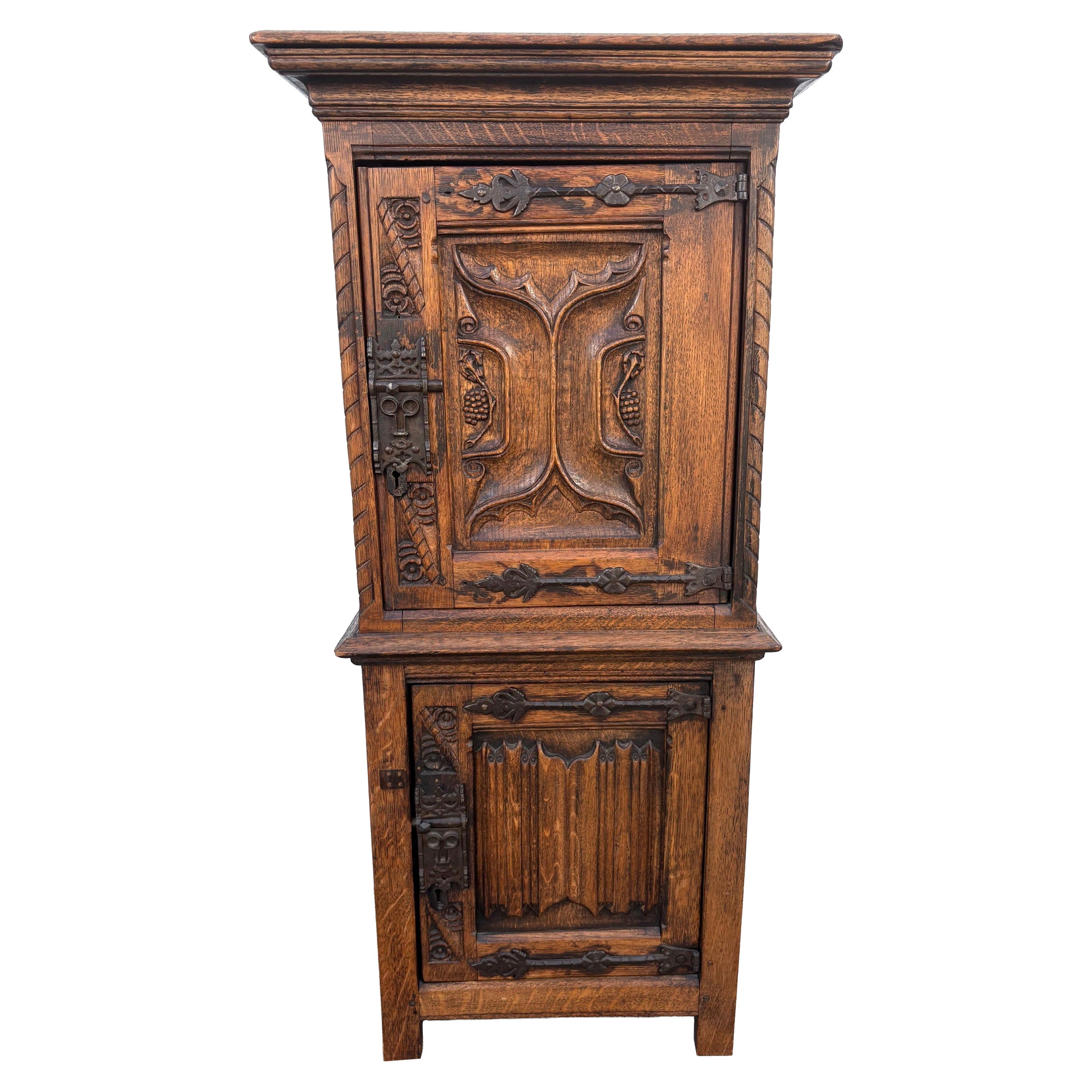 A finely carved Medieval style Gothic Cabinet