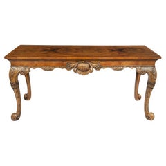 A finely carved walnut side table in the George II style by the Harry Meyers Com