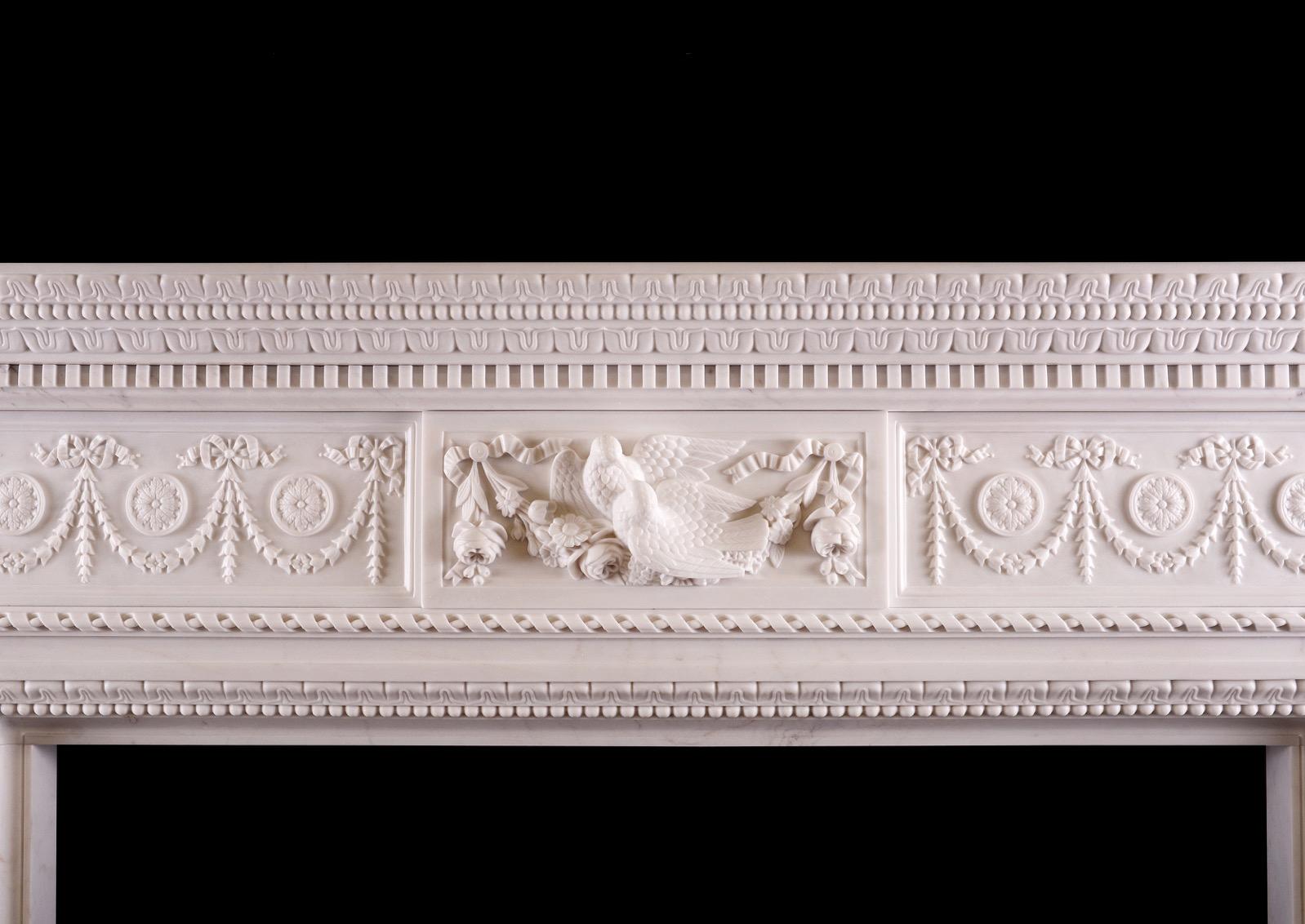 A fine quality reproduction white marble fireplace in the Georgian style. The panelled jambs with finely carved bellflowers and ribbons, surmounted by rope moulding and end blocks with Anthemion leaf. The frieze with rosette paterae and drapery