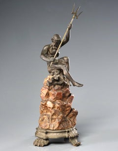A Finely Cast Spelter Figure of Neptune Mounted Atop a Carved Soapstone Base