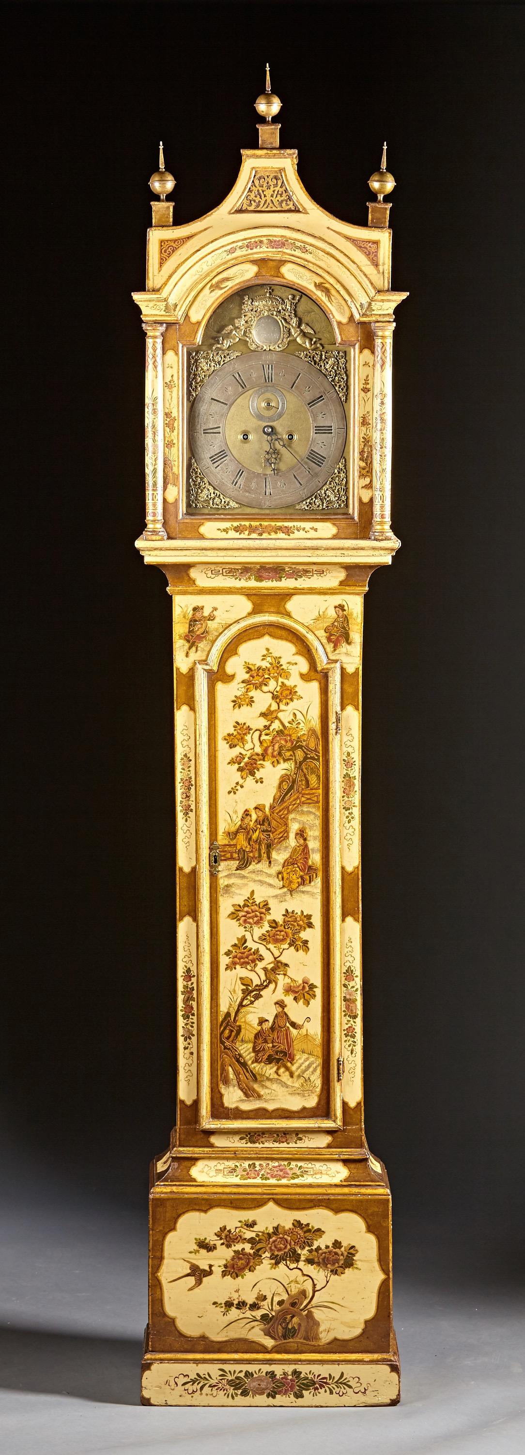 A fine English Georgian cream colored lacquered tall case clock having a pagoda shaped top encasing period movement by Robert Player, London (1700-1740) above a fully decorated case raised on a similarly decorated molded base. English, circa 1740.