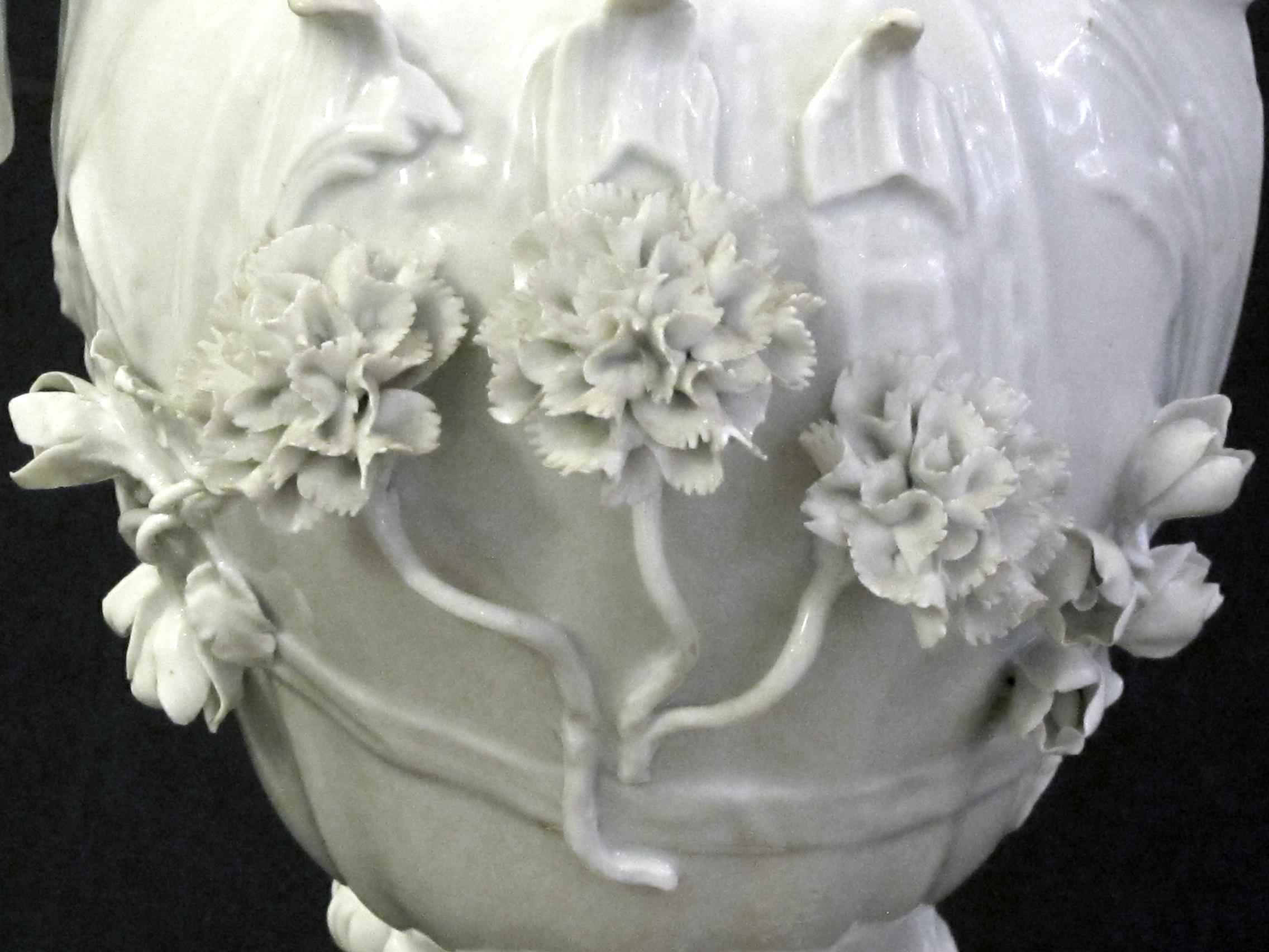 Early 20th Century Finely Rendered Pair of French Rococo Style Blanc-de-chine Urns or Vases