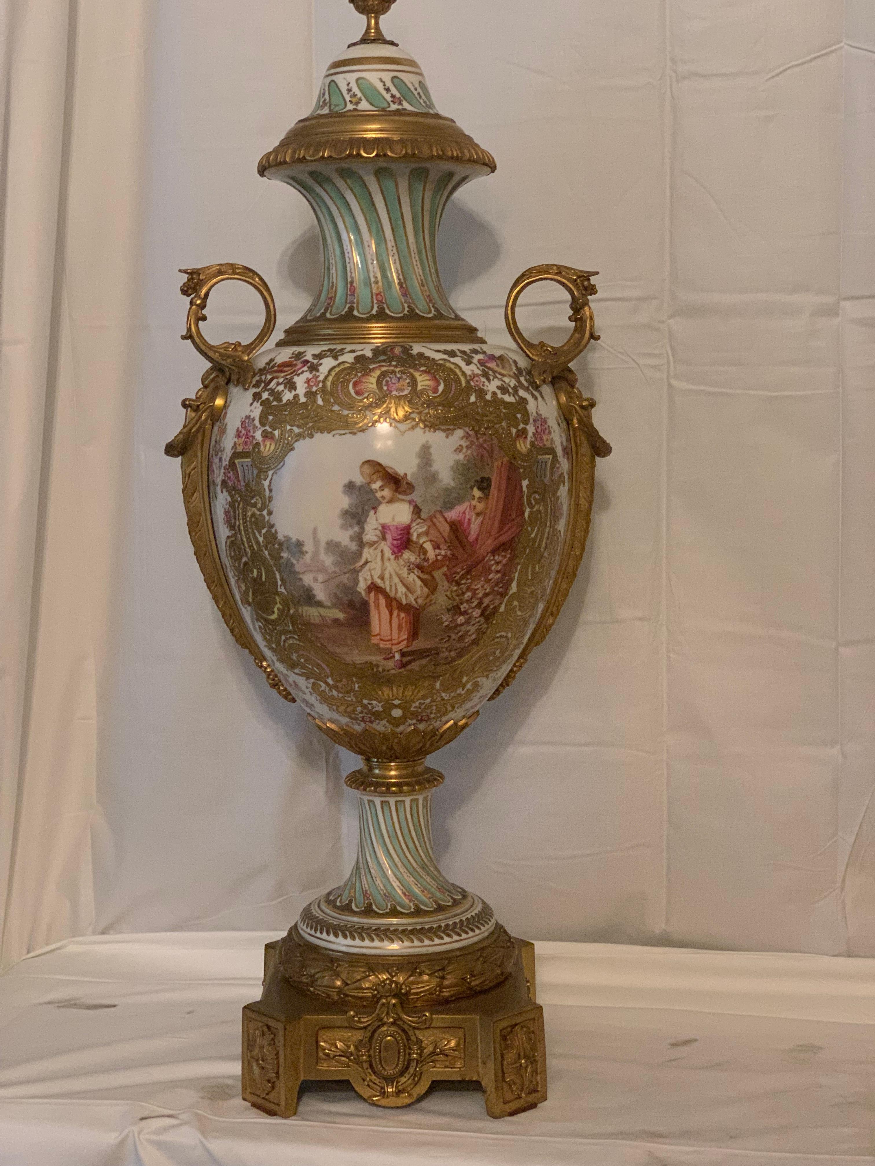 Napoleon III A finely three pieces gilt bronze mounted Sevres style vase and center pieces For Sale