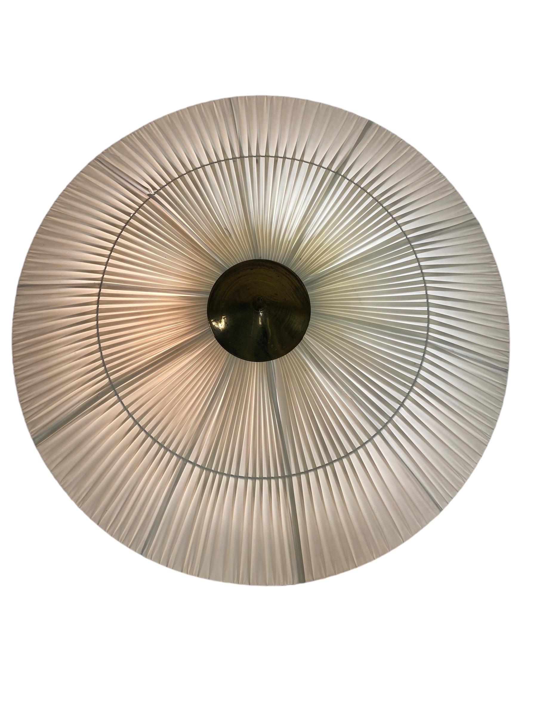 Vintage ceiling lamps like this one were made by different companies in Finland in the 1950s. Itsu along with Taito, Idman and Orno were some of the leading lighting manufacturers in mid-century Finland that produced such lamp. The specific lamp