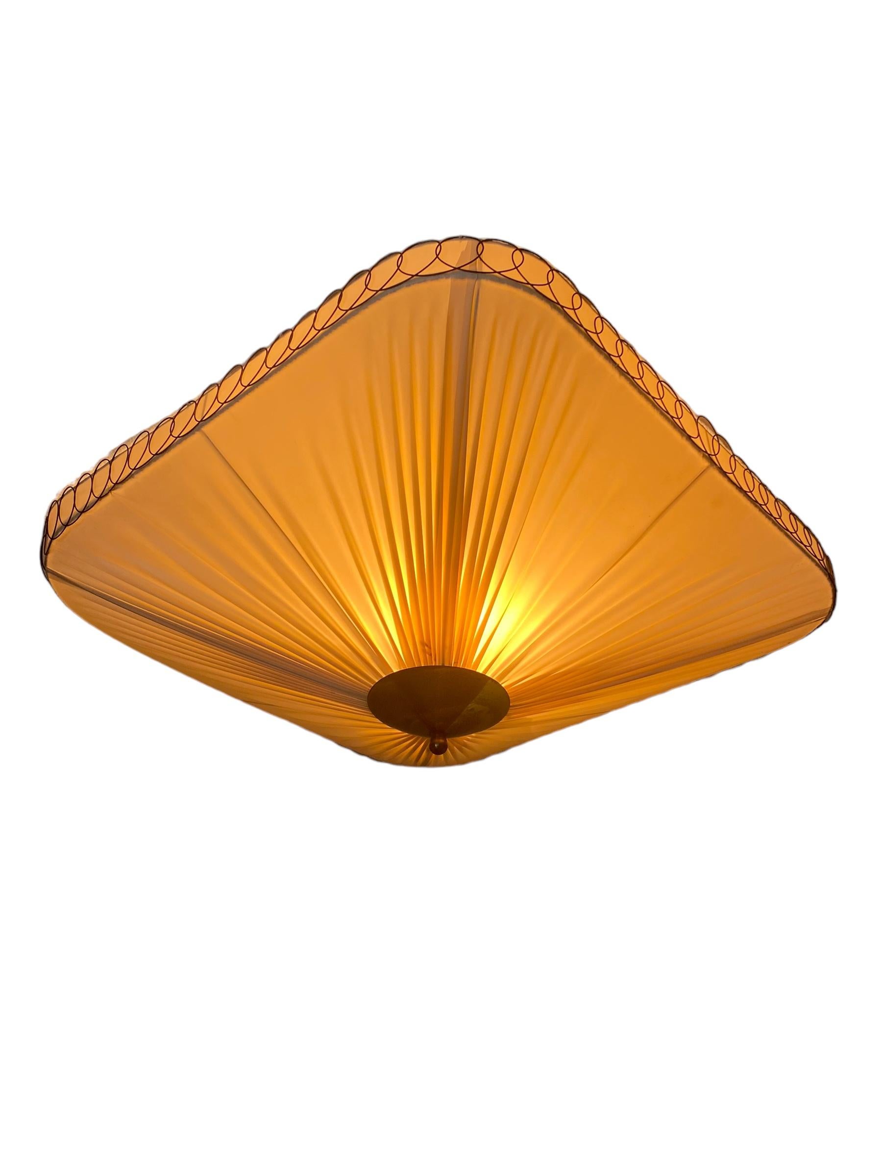 Vintage ceiling lamps like this one were made by different companies in Finland in the 1950s. Itsu along with Taito, Idman and Orno were some of the leading lighting manufacturers in mid century Finland. This lamp is very difficult to attribute to a