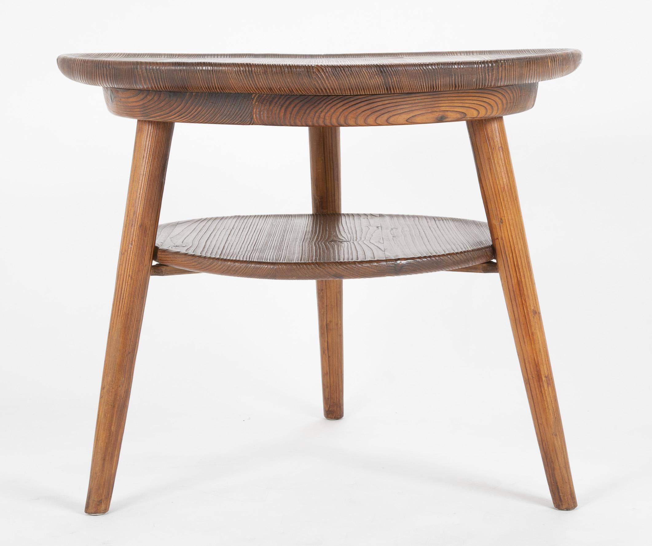 An interesting side table or center table designed by Andre Sornay. The fir has been treated in the Japanese technique shou sugi ban, in which the wood is first burned and then scraped making the 