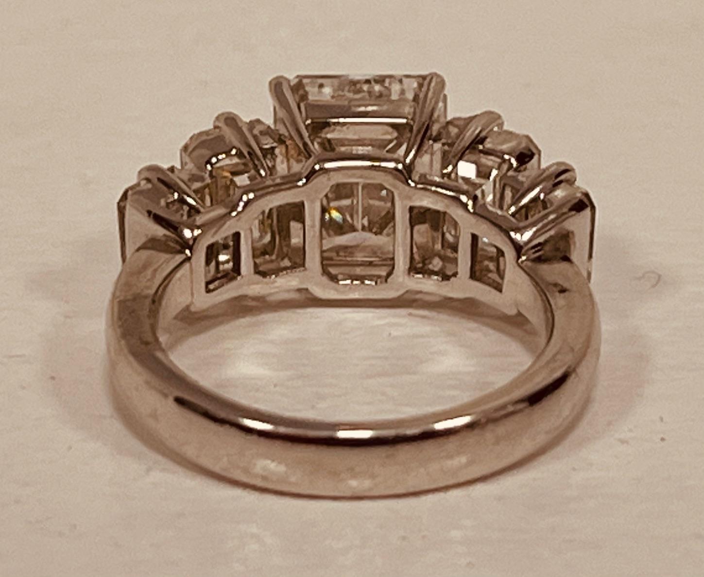 A Five Stone Diamond Ring Centring A 3cts Emerald-cut Diamond For Sale 1