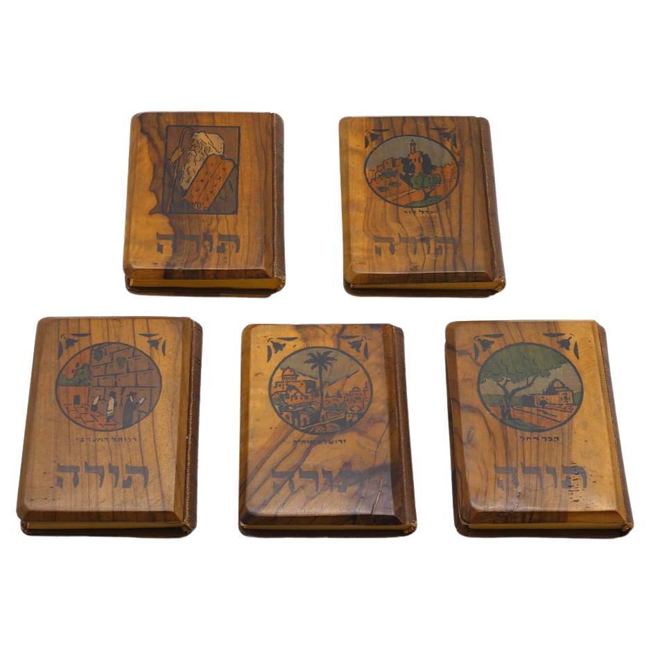 A Five Volume Bible Set in Miniature Carved Olivewood Bindings Israel C. 1940