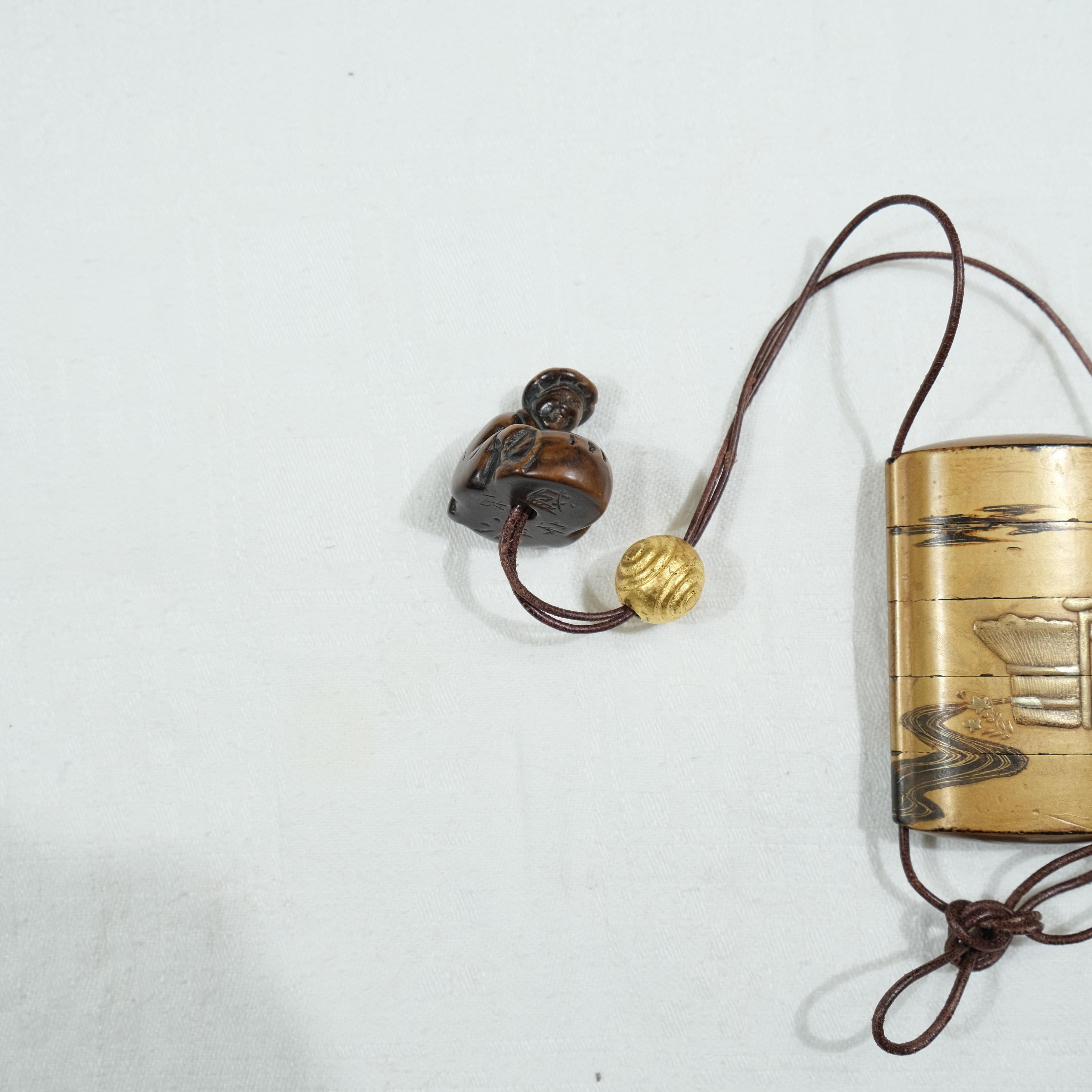 19th Century A fivepart Japanese lacquer inro with netsuke, late 19th c. For Sale