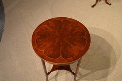 A flamed mahogany Edwardian Period circular occasional table