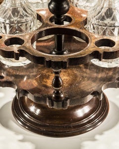 Flat Diamond Cut Suite of Cruet Bottles in Mahogany Stand