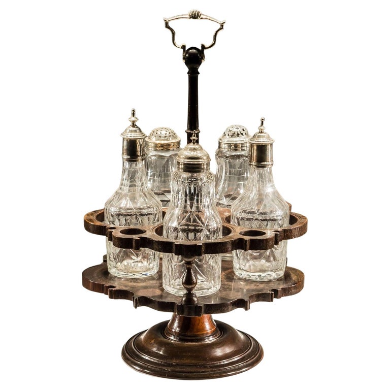 Flat Diamond Cut Suite of Cruet Bottles in Mahogany Stand For Sale at