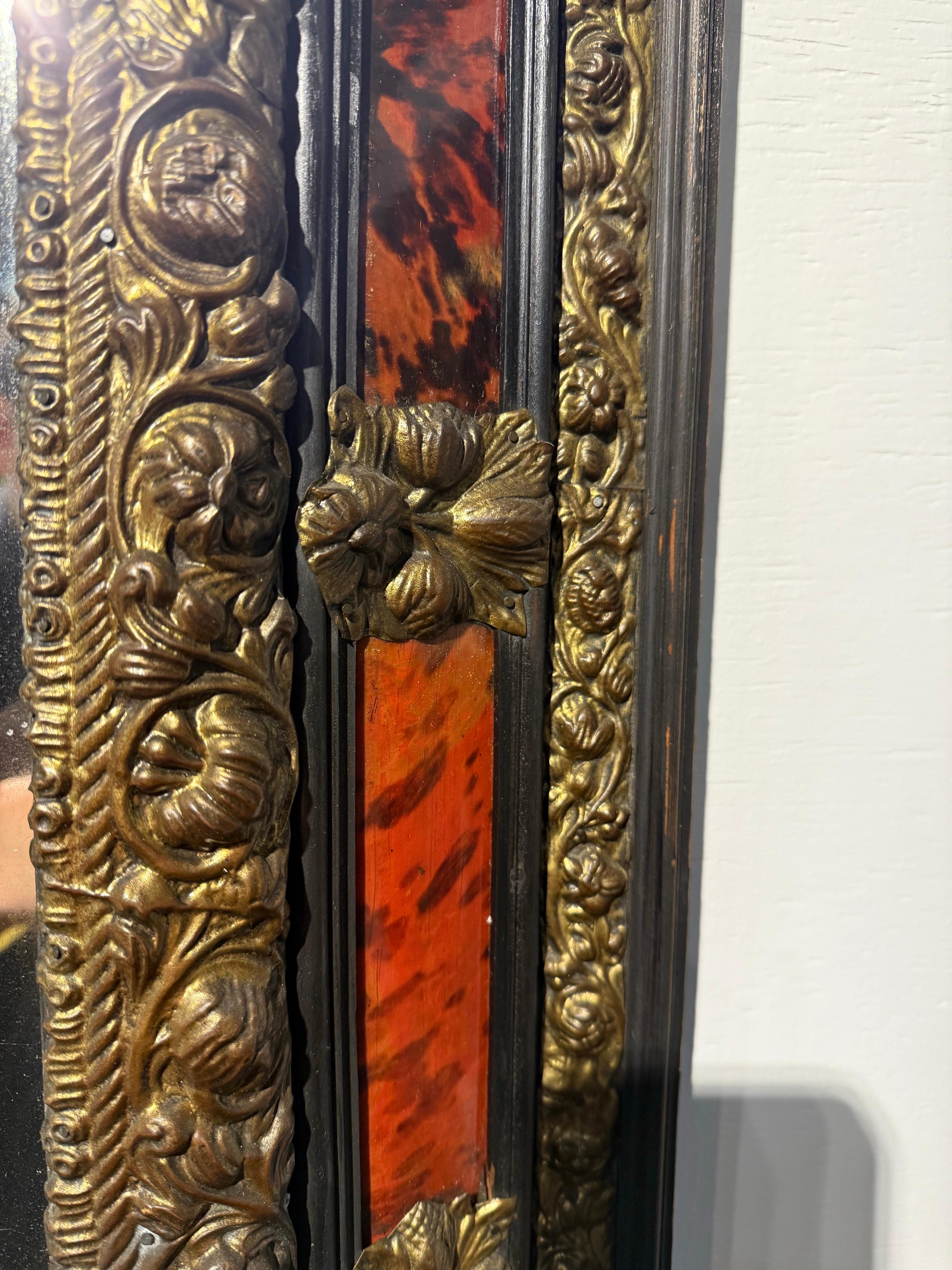 Brass A Flemish Faux Tortoiseshell and Repousse Mirror, 19th Century For Sale