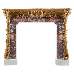 Cheminée en marbre et bois doré Fleur de Pêche