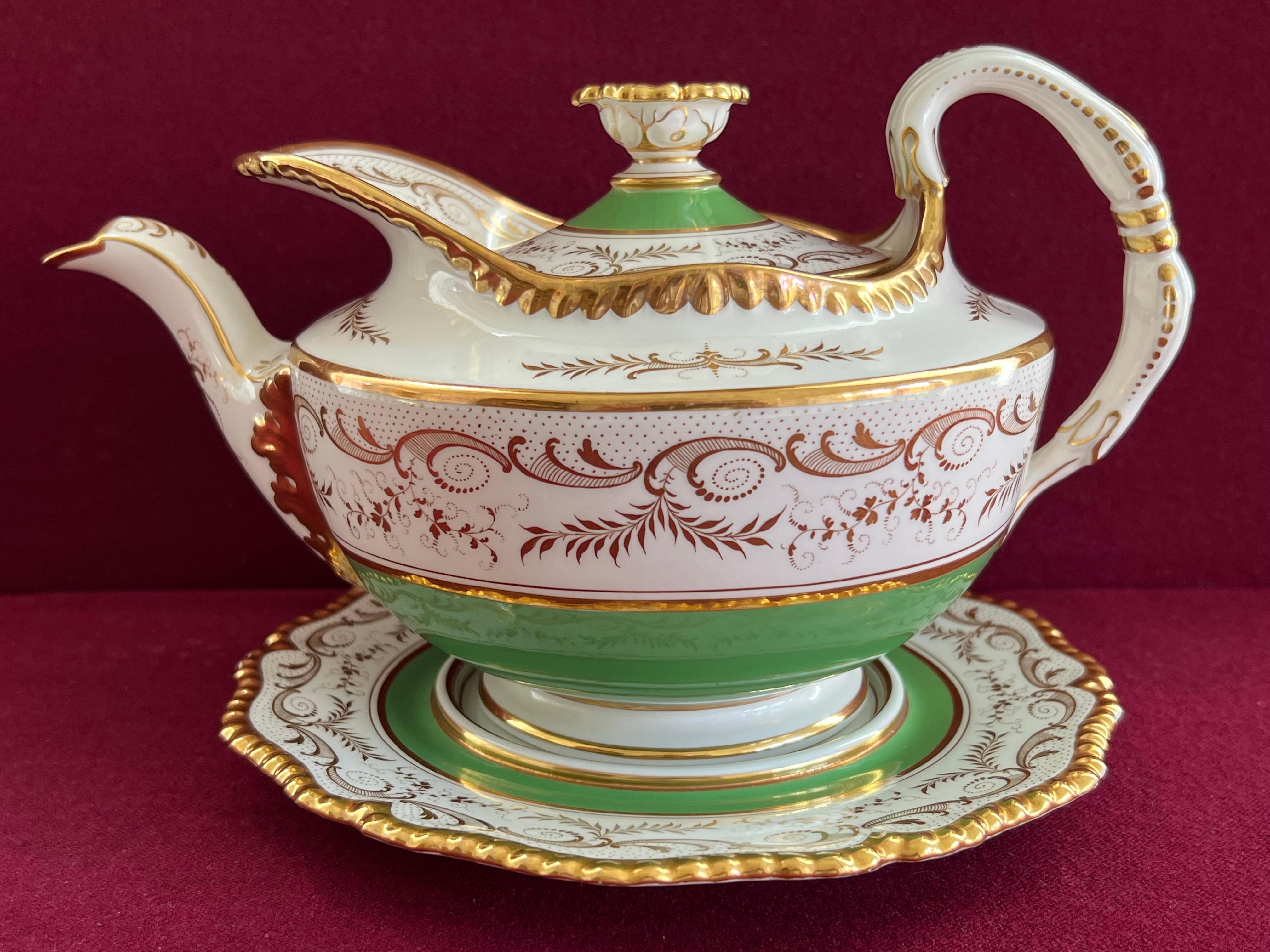 A wonderful Flight Barr & Barr Worcester Porcelain Tea & Coffee Set c.1820-30. Gilt gadrooned edge, lime green ground and stylised gilt motifs.

Consisting of:

1 Teapot & Stand

2 Plates

10 Tea cups

10 Coffee cups 

15 Saucers 

1
