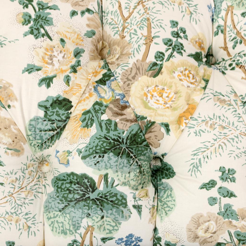 American A Floral Loveseat with Tufted Back and Pleated Skirt