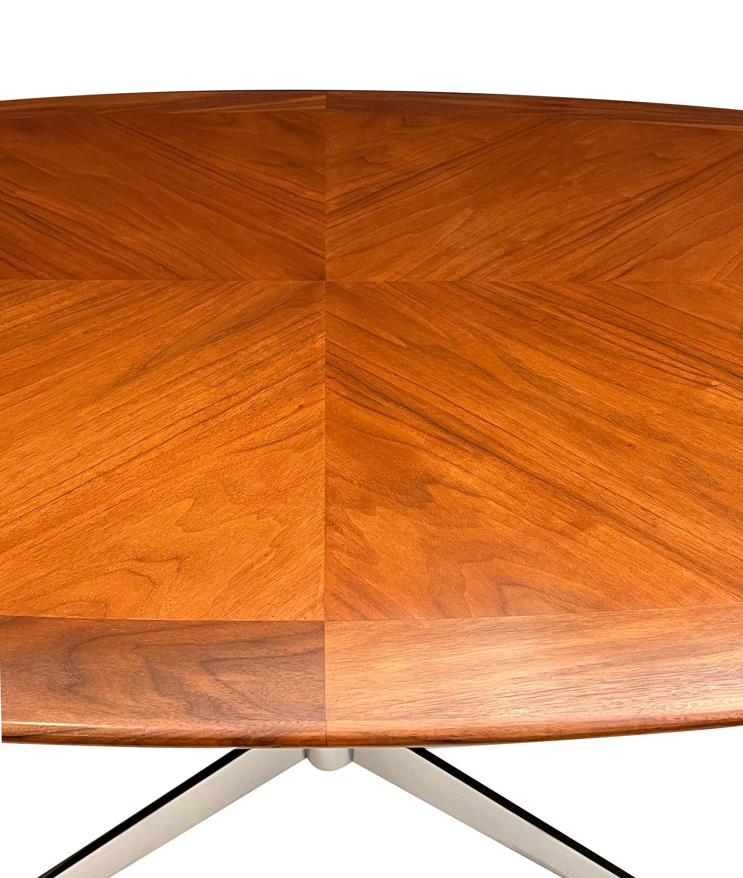 A Florence Knoll Walnut and Chrome Oval Dining Table by G.M. Proctor & Sons In Good Condition For Sale In San Francisco, CA