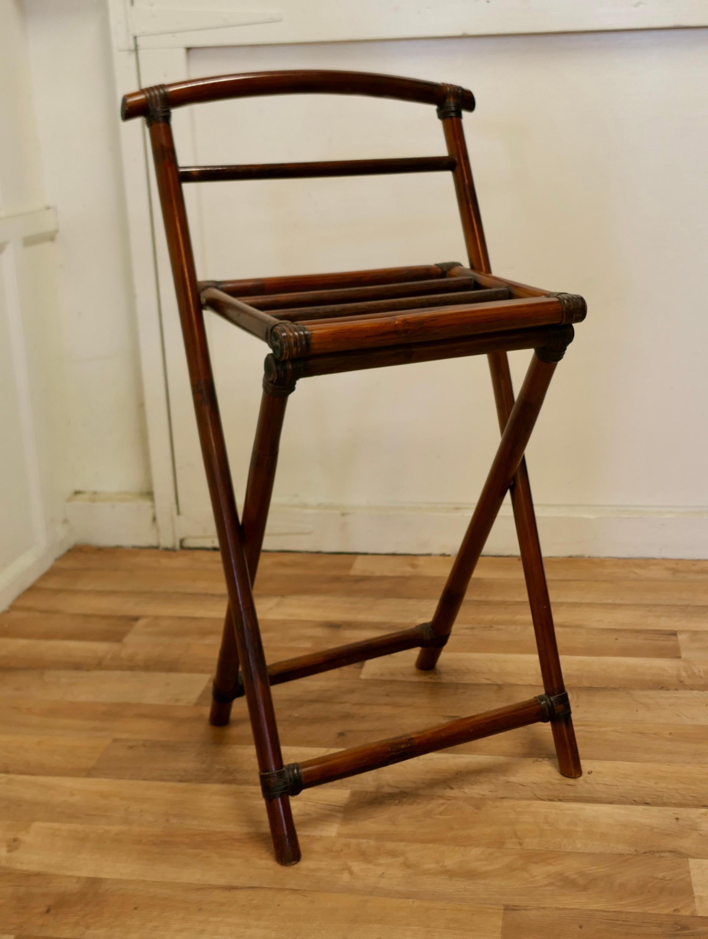  A Folding Bamboo Luggage Rack

This is a good sturdy piece, it is made in chunky bamboo, the stand is very robust and it has the added advantage that it folds flat for storage when not in use

The stand is 21” long, 16” wide and it is 43” high
THM35