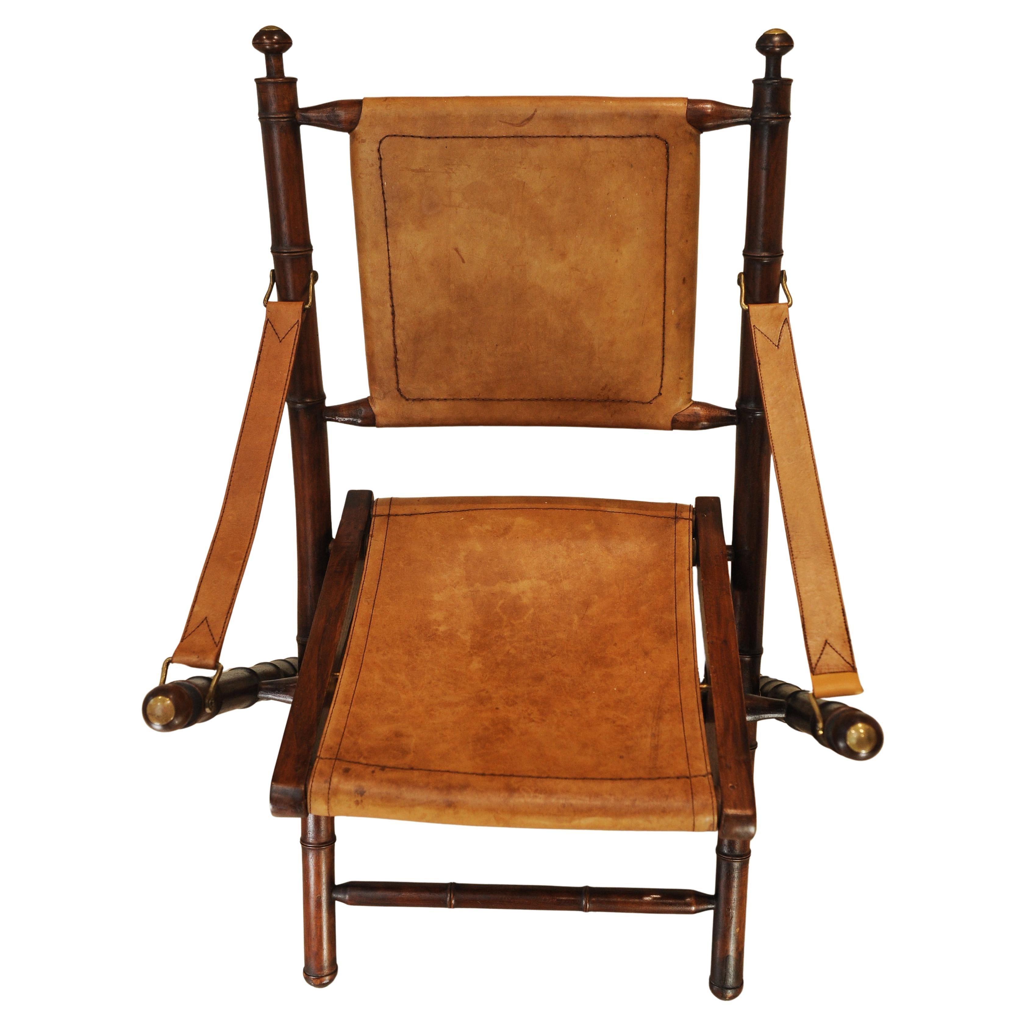 A Folding Safari Chair With Stitched Tan Leather Straps & Seat Faux Bamboo Legs In Good Condition For Sale In Reading, Berkshire
