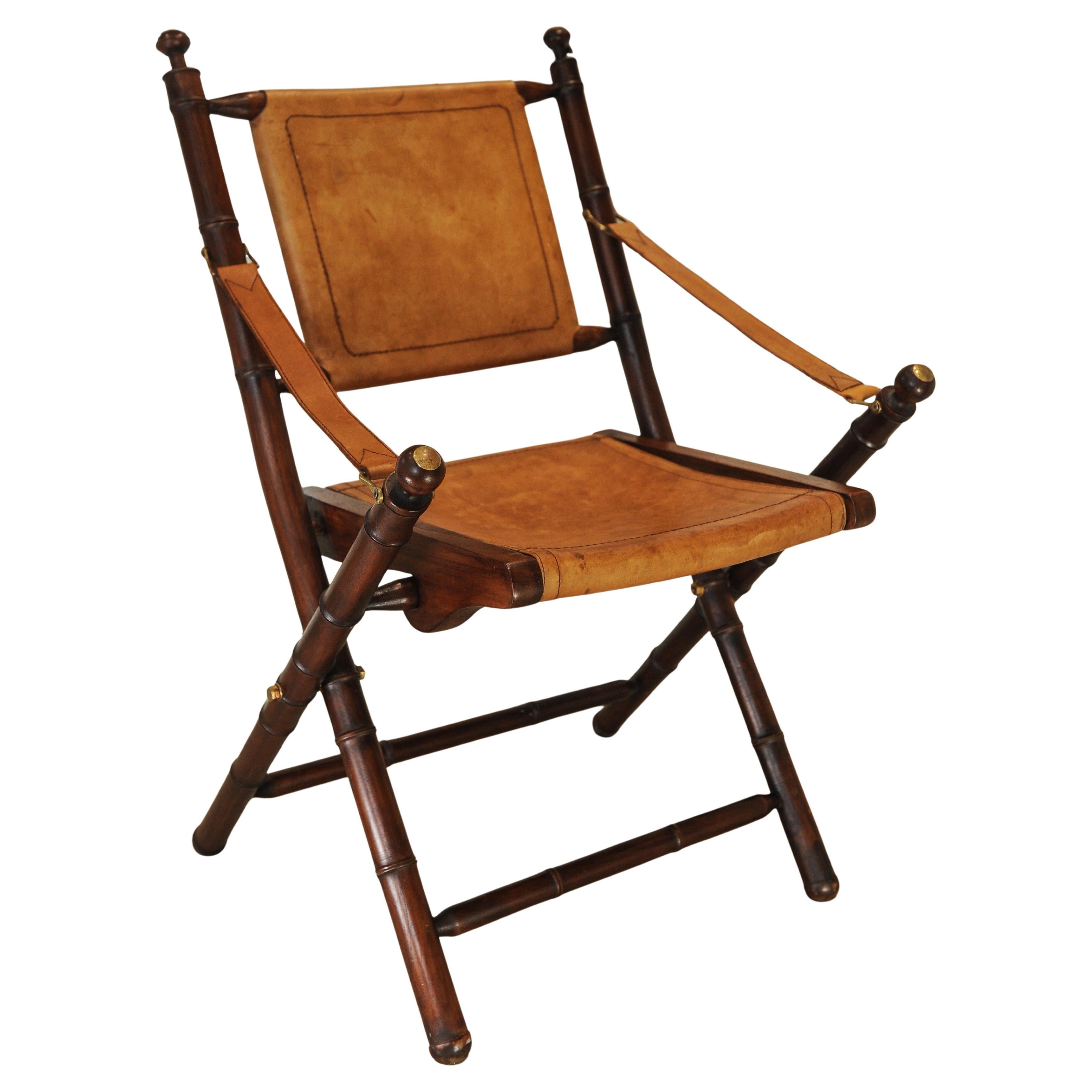 Brass A Folding Safari Chair With Stitched Tan Leather Straps & Seat Faux Bamboo Legs For Sale