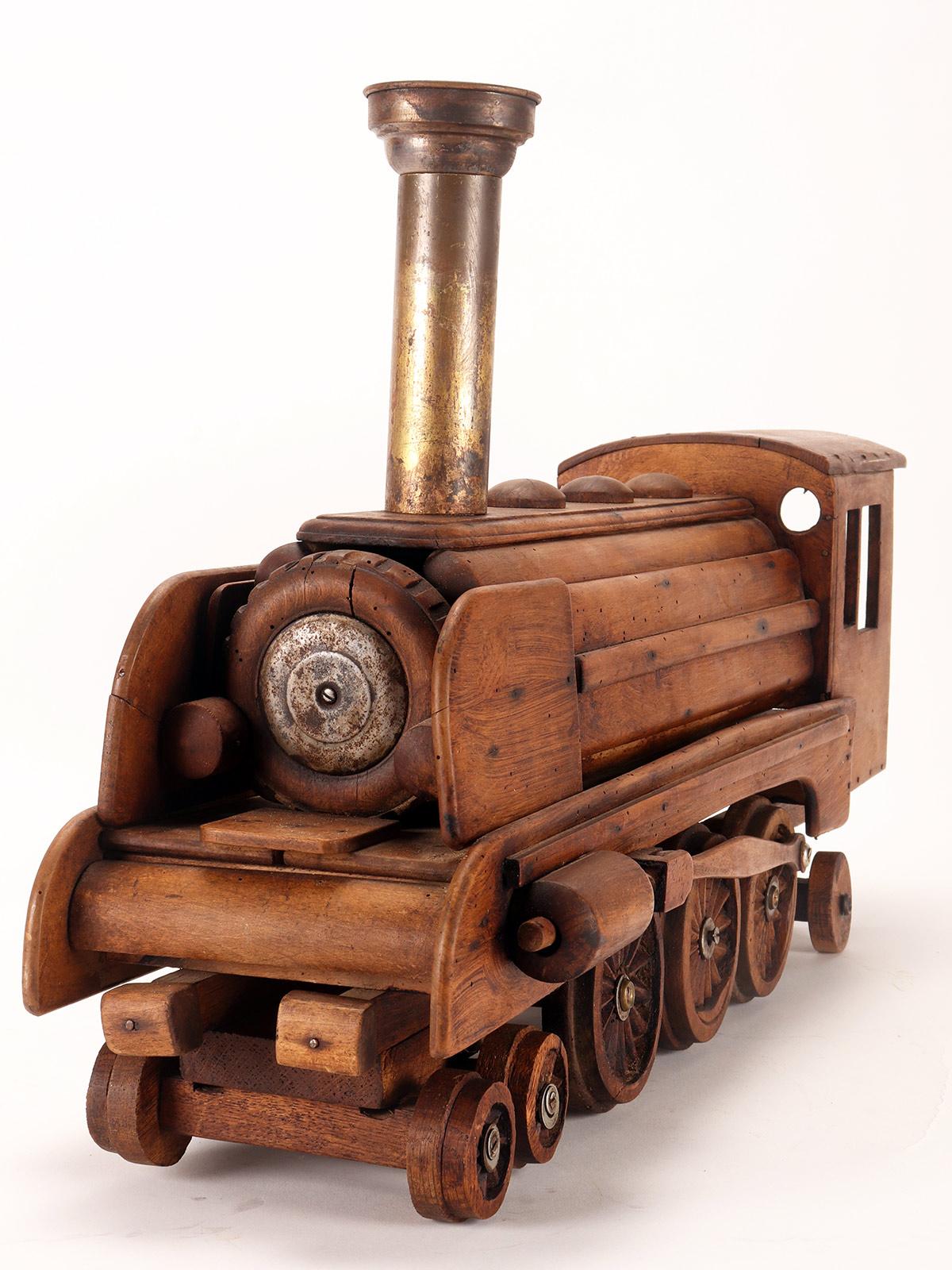 Ein Volkskunstmodell eines Spielzeugs, das eine Dampfzug darstellt, USA 1900. im Angebot 5