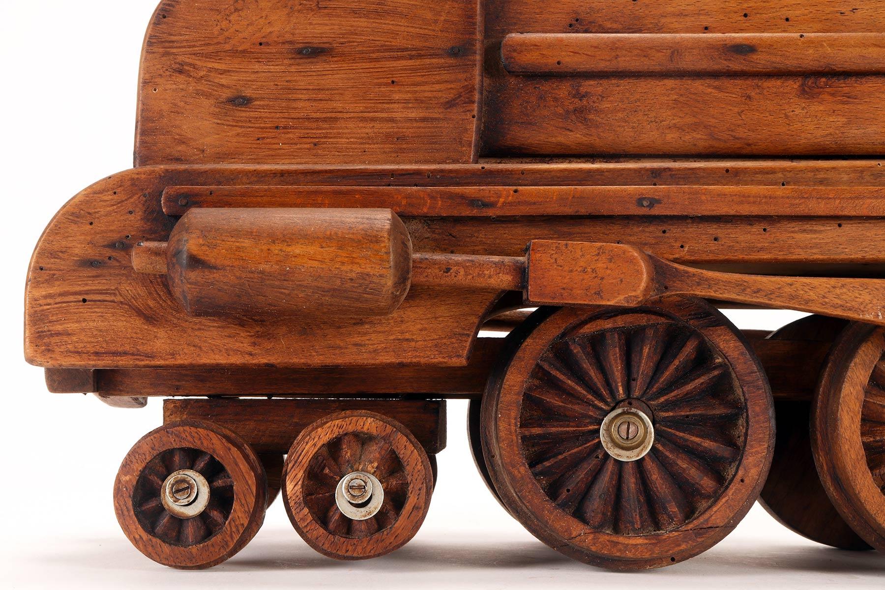Ein Volkskunstmodell eines Spielzeugs, das eine Dampfzug darstellt, USA 1900. im Angebot 8