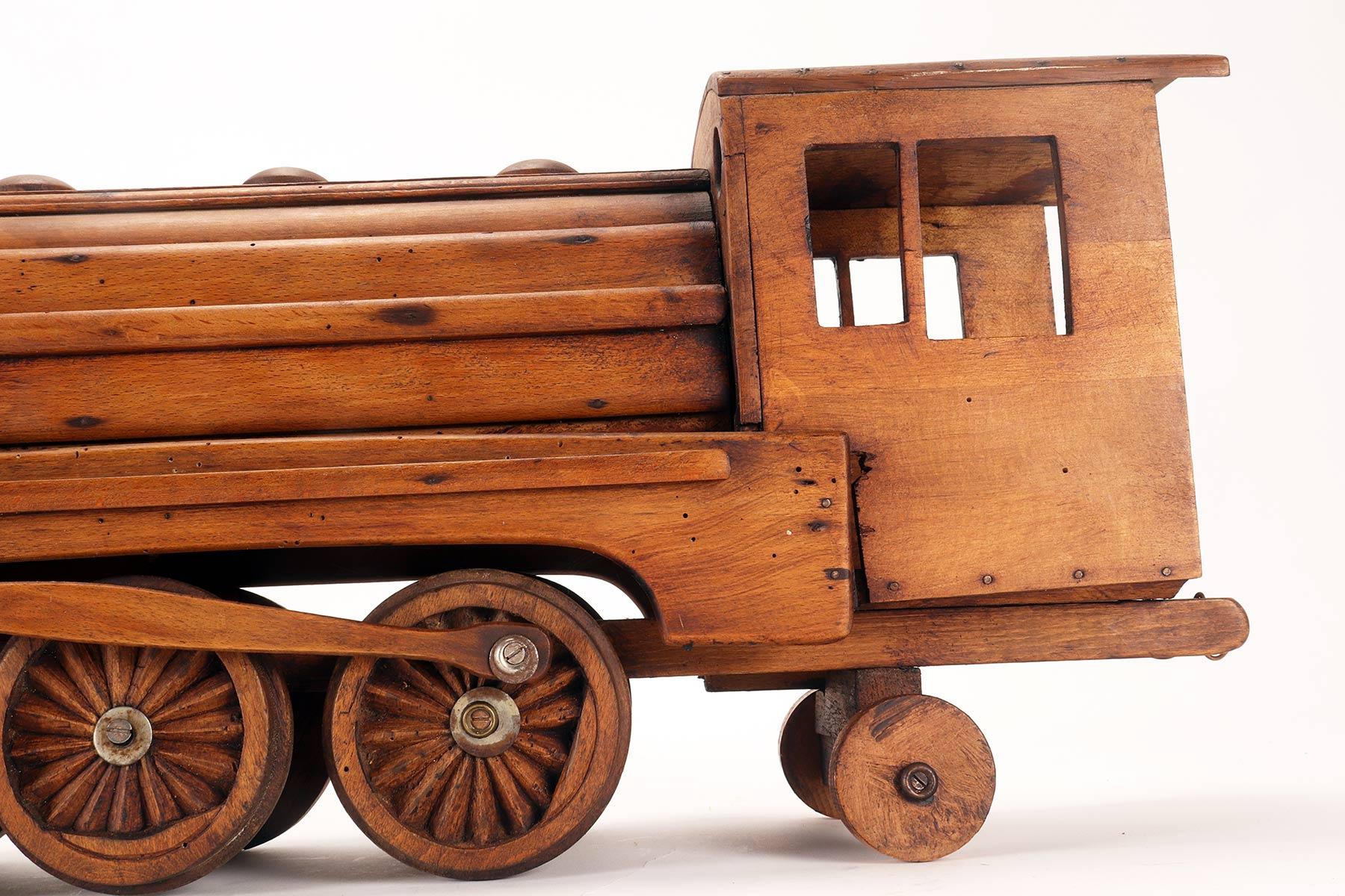Ein Volkskunstmodell eines Spielzeugs, das eine Dampfzug darstellt, USA 1900. im Angebot 9