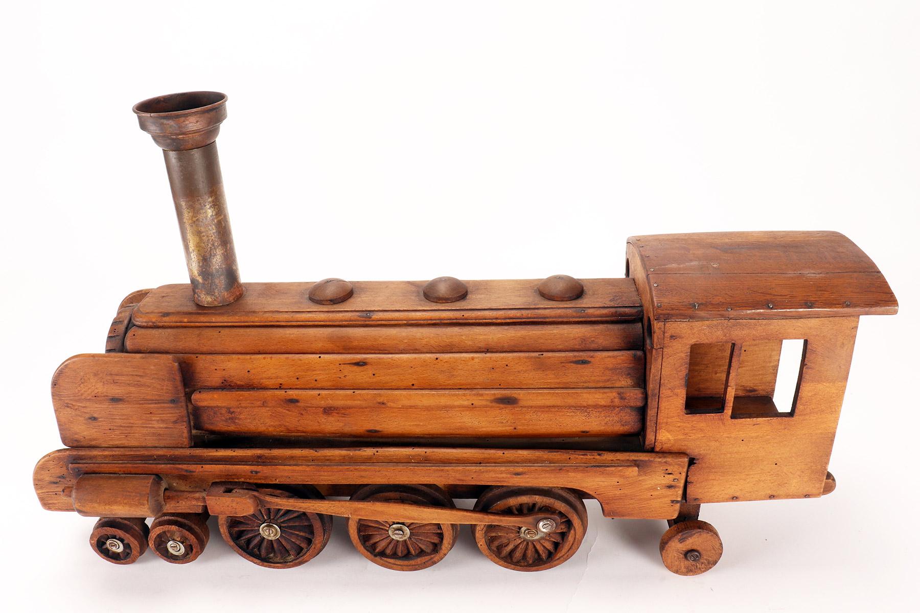 Ein Volkskunstmodell eines Spielzeugs, das eine Dampfzug darstellt, USA 1900. im Angebot 10