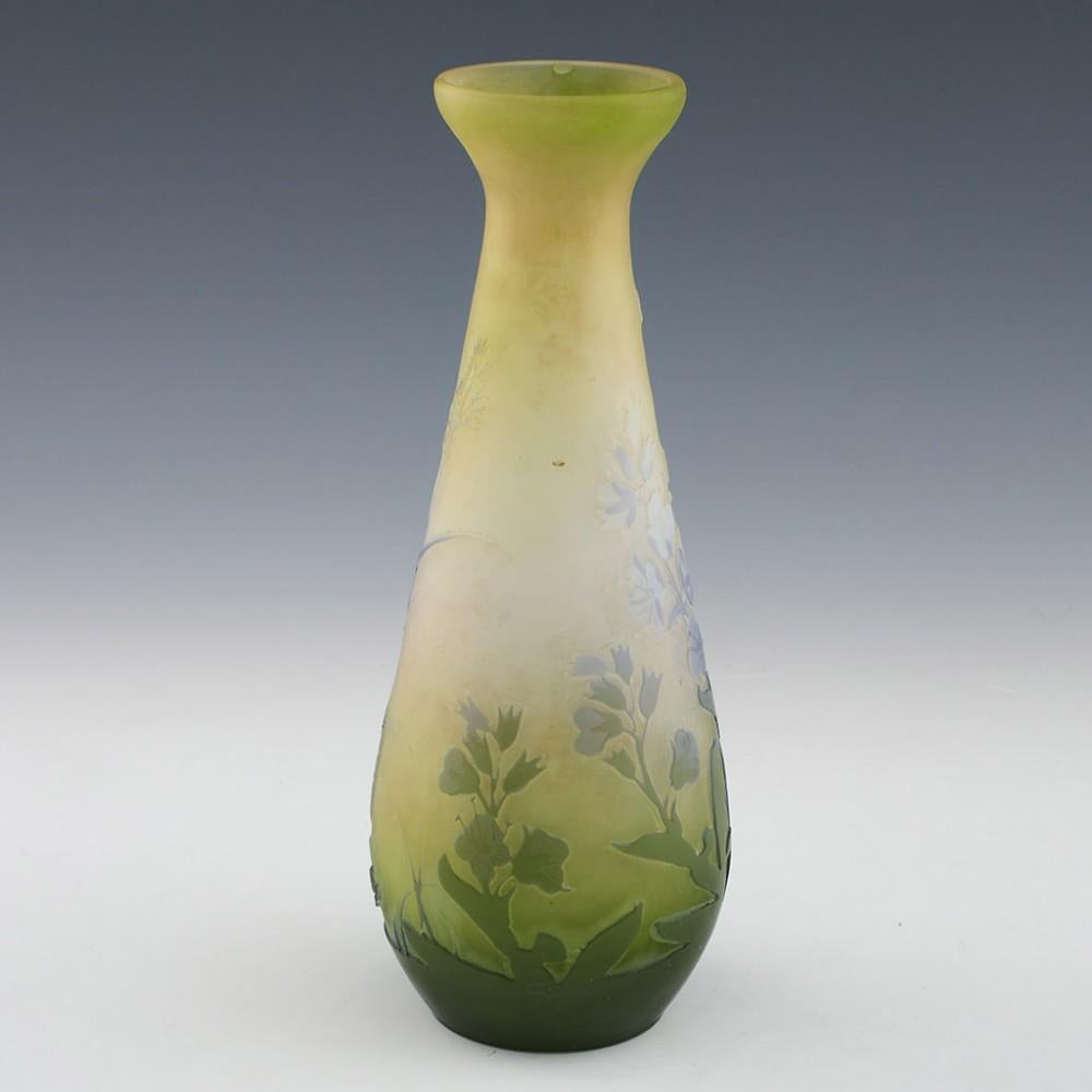 Heading : A Four Colour Galle Acid Cameo Vase
Date : c1920
Origin : Nancy, France
Bowl Features : Pale lilan and clear. white flowers above high relief green leaves on a fristed pale green and clear ground
Marks : Galle cameo signature with epsillon