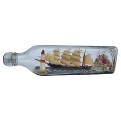 Antique A four mast 18th century ship in a bottle, English folk art circa 1920