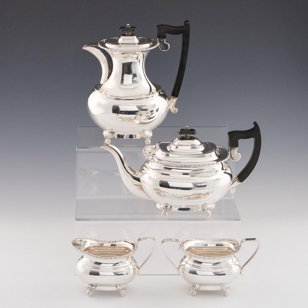 Heading : a four piece sterling silver tea set. Teapot, Hot Water Jug, Creamer and Sucrier
Date : Hallmarked in Sheffield 1942 For Edward Viner
Period : George VI
Origin : Sheffield, Yorkshire, England
Decoration : Beaded rims, claw and ball
