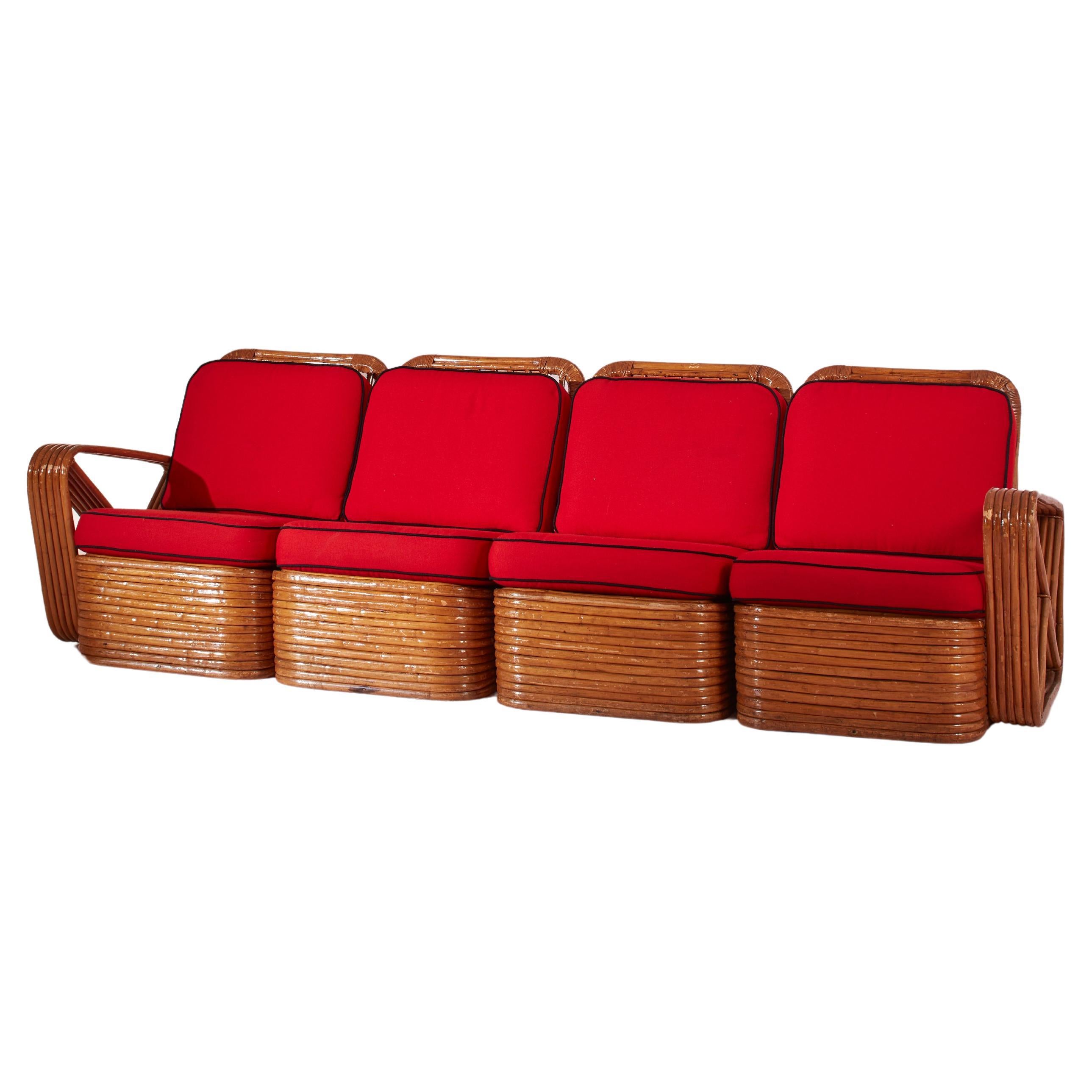 A four-seat rattan and fabric sectional sofa in the style of Paul Theodore Frank
