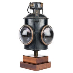 A four way railway signalling light