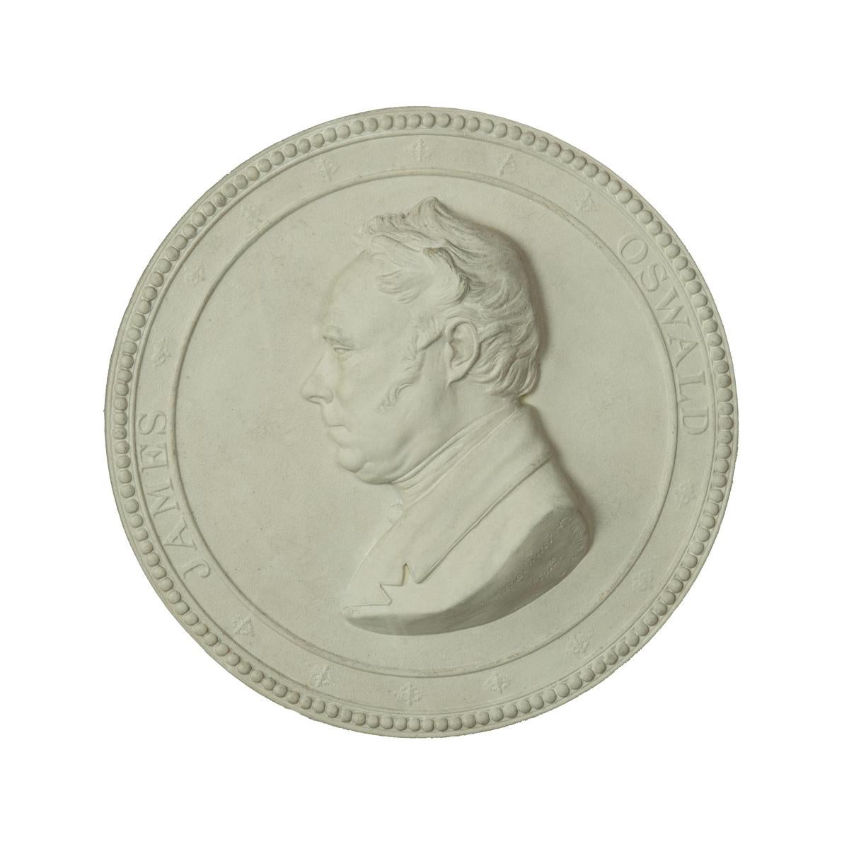 Plaque de portrait en plâtre encadrée du député réformiste de Glasgow James Oswald, signée et datée Carlo Marochetti, 1842, de forme circulaire, représentée de face à droite dans une bordure noire et un cadre d'origine en bois doré et vitré.

Une