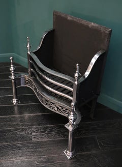 A Free-Standing Polsihed Steel Fire Grate in the Georgian Form