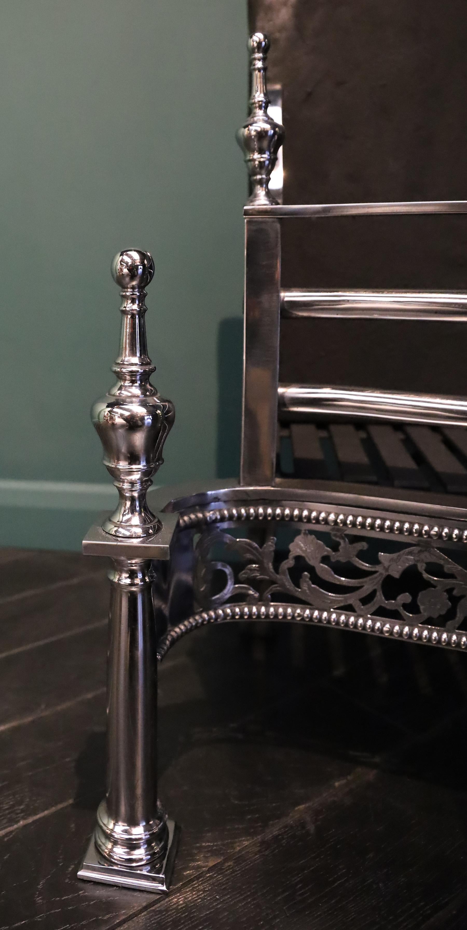 A Free-Standing Polsihed Steel Fire Grate in the Georgian Form (Poliert) im Angebot