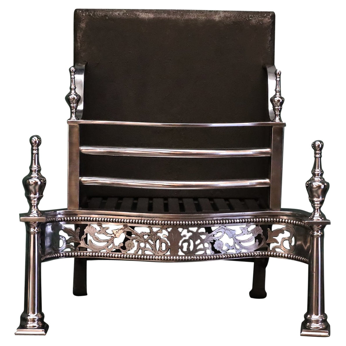 A Free-Standing Polsihed Steel Fire Grate in the Georgian Form