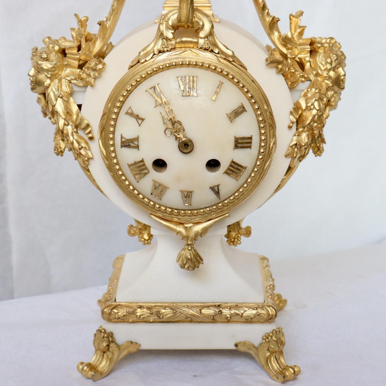 A French 1870 Louis XVI Style Ormolu and Marble Mantel Clock  1