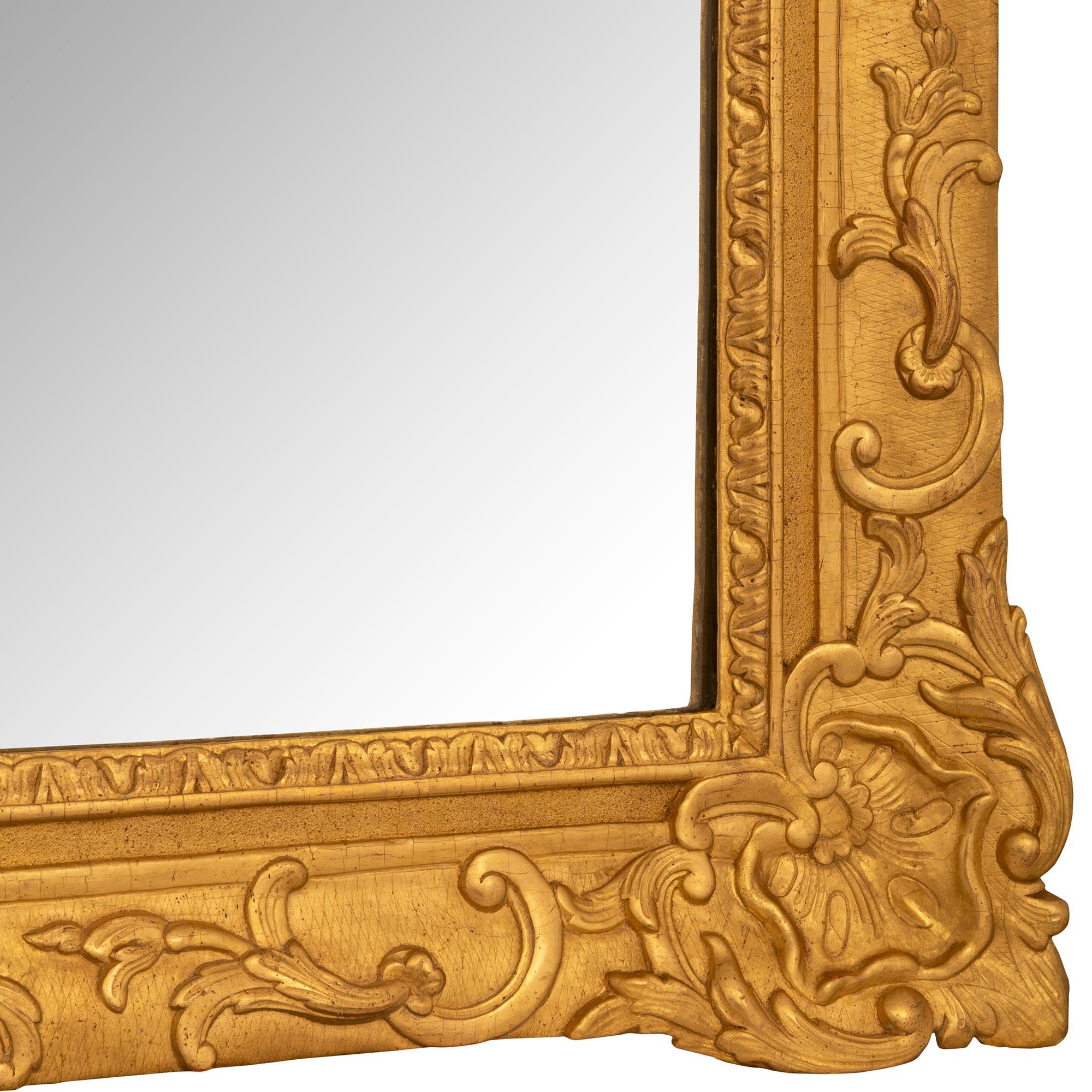 A French 18th century Regence period rectangular giltwood mirror For Sale 2