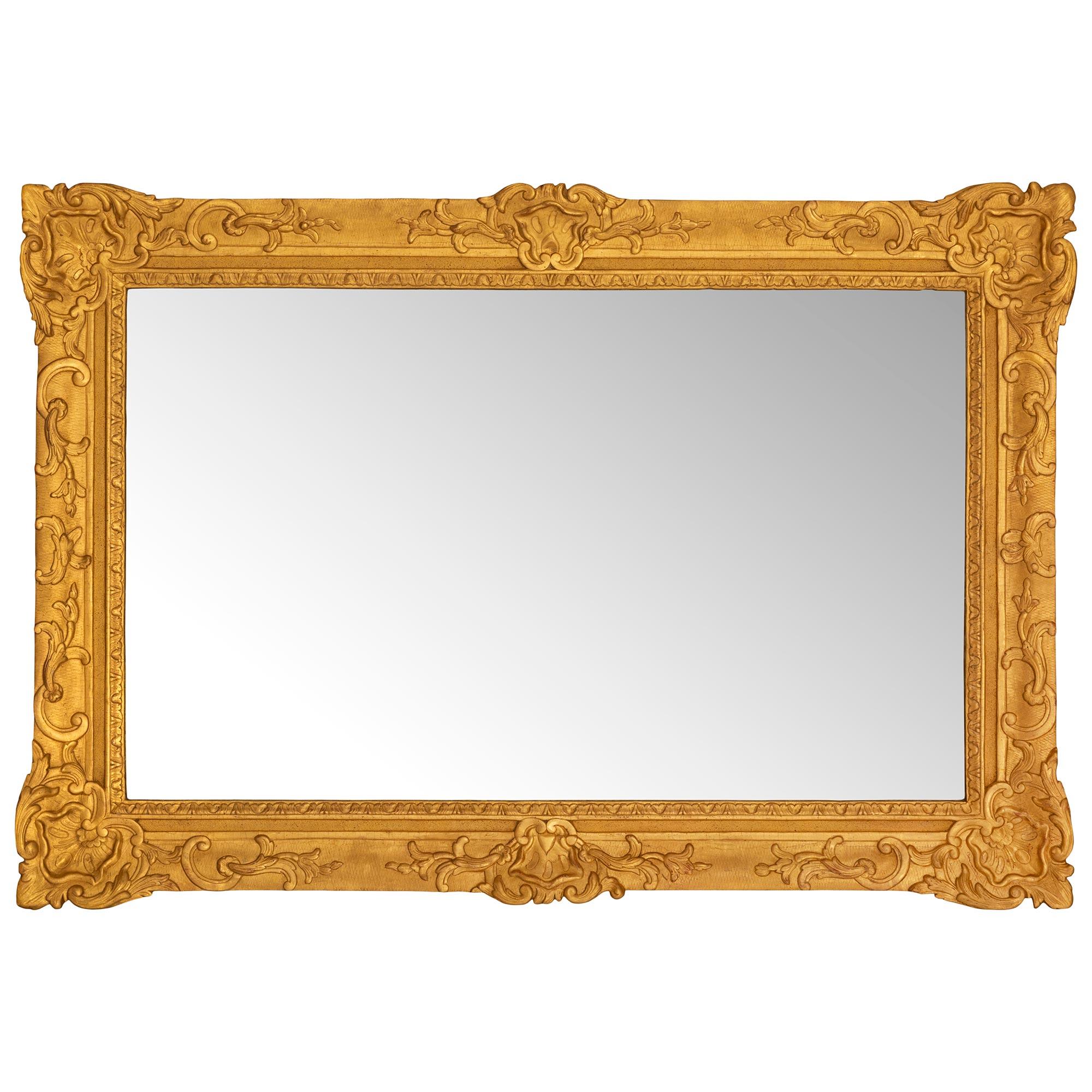 A French 18th century Regence period rectangular giltwood mirror For Sale 3