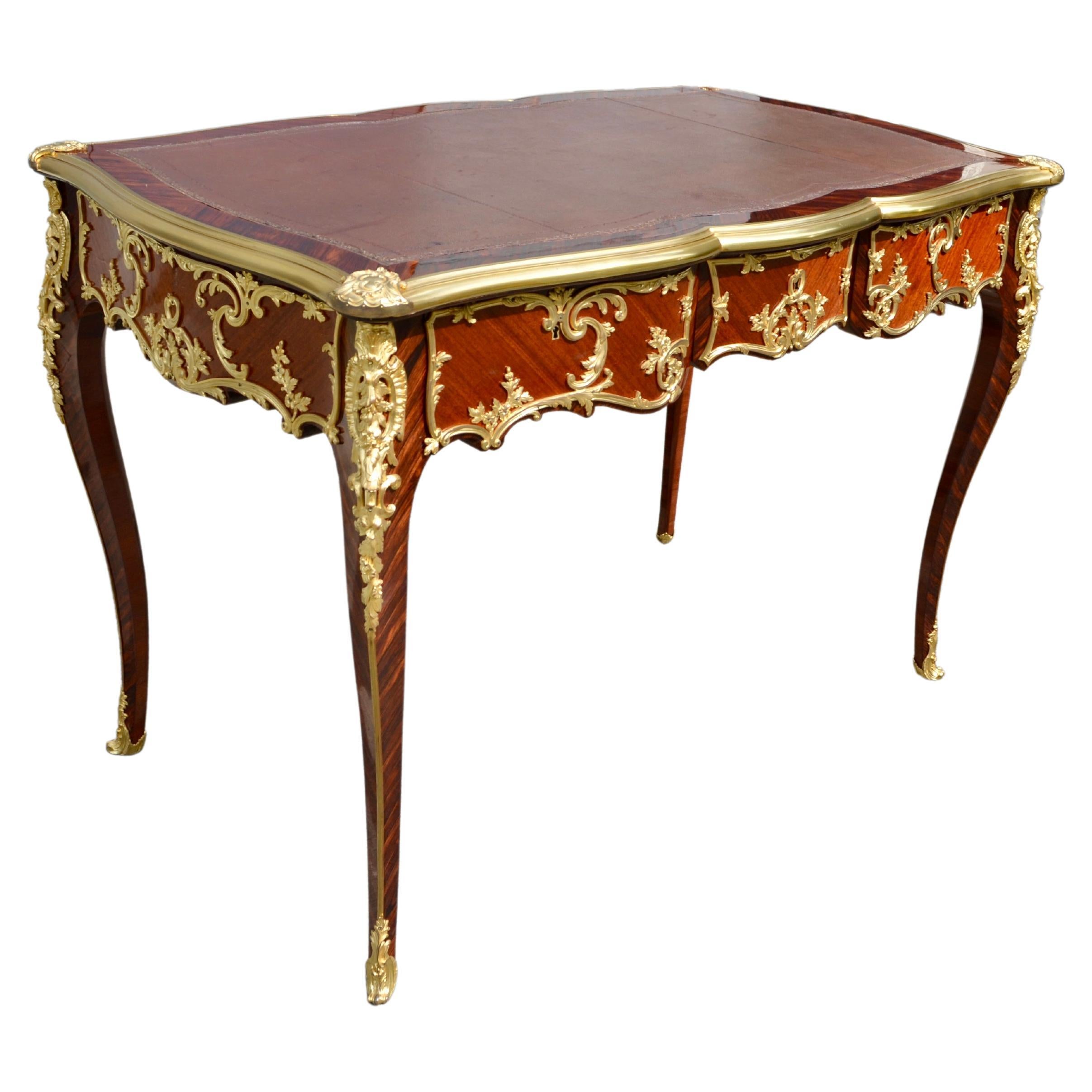 Finest quality late 19th C French ladies writing desk stamped twice G Durand. on the underside of the writing surface. The oak carcass is veneered in kingwood and mahogany and richly embellished with the finest chaste and gilded bronze in the full