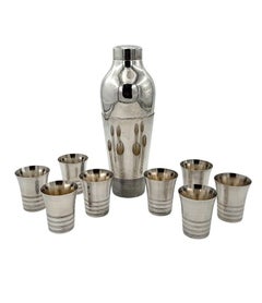 A French 1930s Silver plated Art Deco cocktail set with shaker and 8 glasses