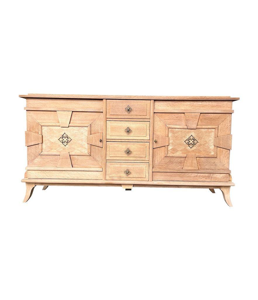 A French 1940s bleached oak sideboard with door detail and original handles. For Sale 10
