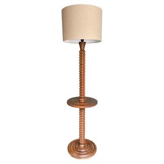 A French 1940s brutalist oak floor lamp attributed to Charles Dudouyt